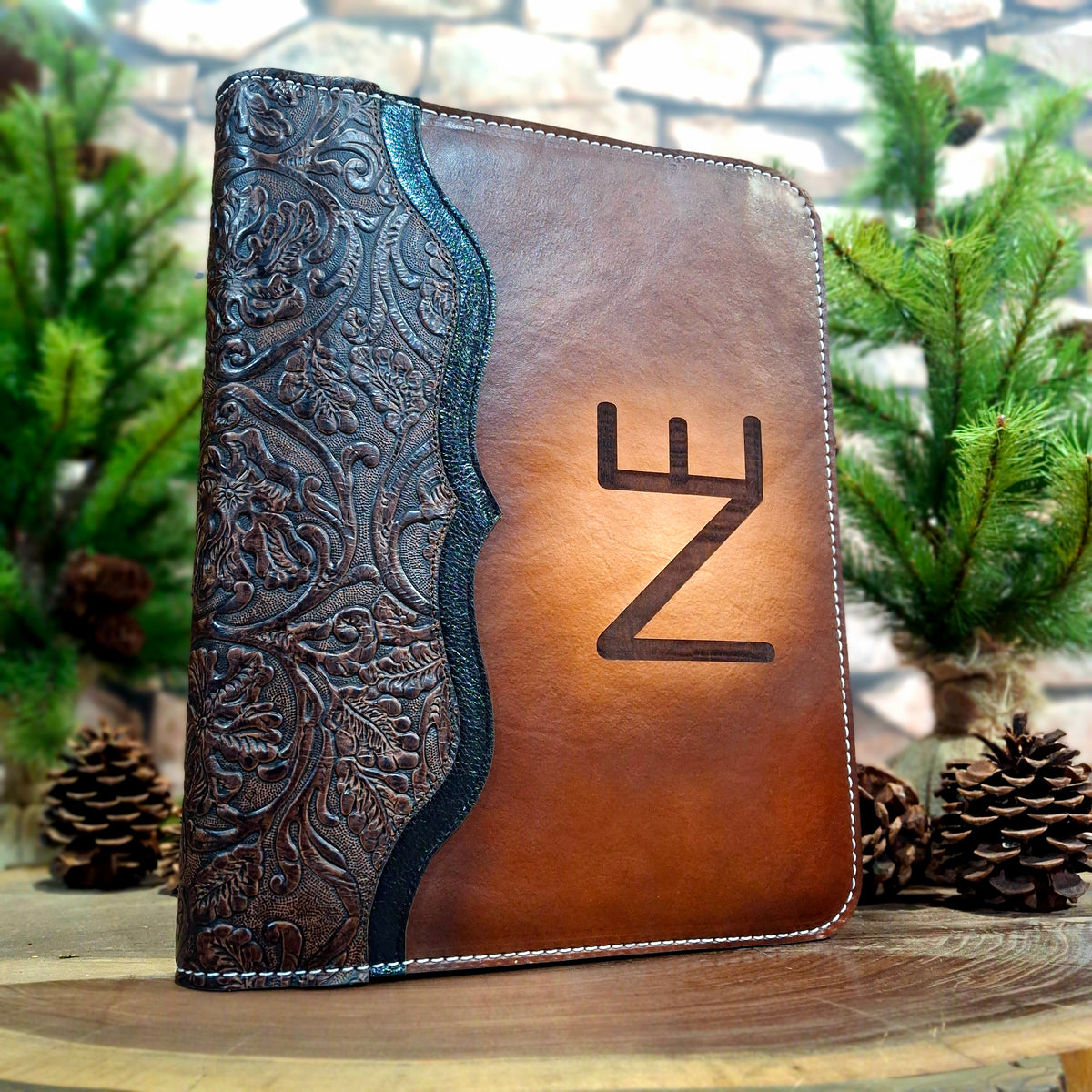 Leather portfolio with embossed and smooth leathers. Personalized with a livestock brand logo.